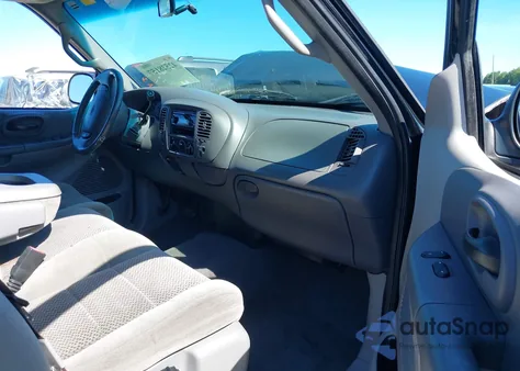 2001 Ford F150 z USA, uszkodzony, nr VIN 2FTRX18W71CA99637